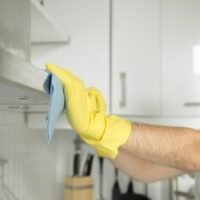 cleaning with rubber gloves